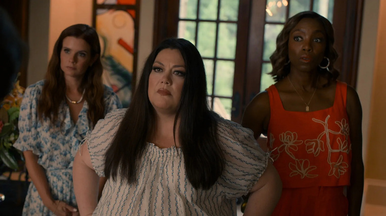 Maddie, Dana, and Helen looking at something impatiently on Sweet Magnolias