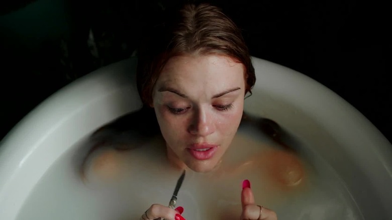 Holland Roden as Zoe Woods in the bathtub with a blade in the Channel Zero episode All You Ghost Mice