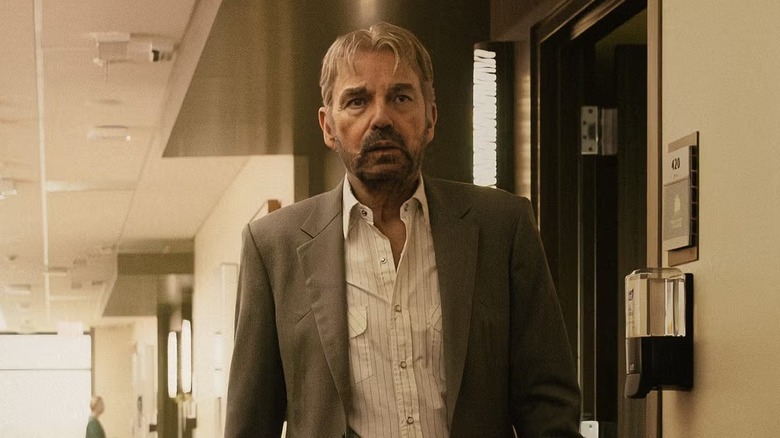 Tommy Norris walks through a corridor on Landman
