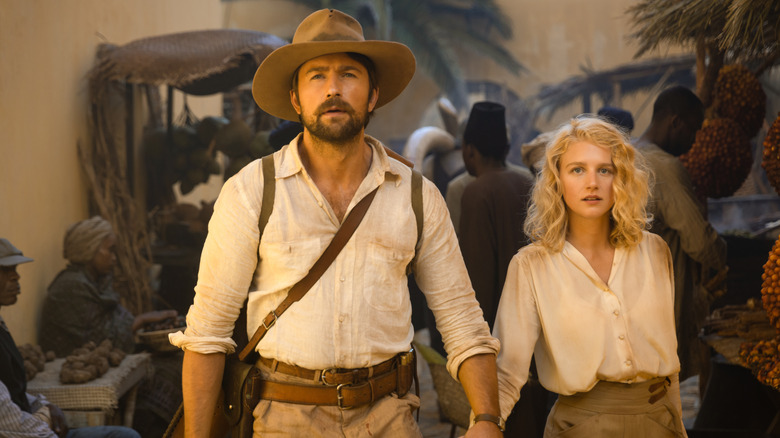 Spencer Dutton by Brandon Sklenar and Alexanda by Julia Schlaepfer holds his hand in the 1923 Ghost of Zebrina episode
