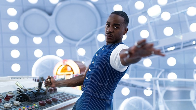 Ncuti Gatwa's Doctor Who reaches out his arm in Doctor Who