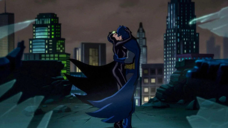 Batman: Hush animated Batman and Catwoman kissing, framed through broken window