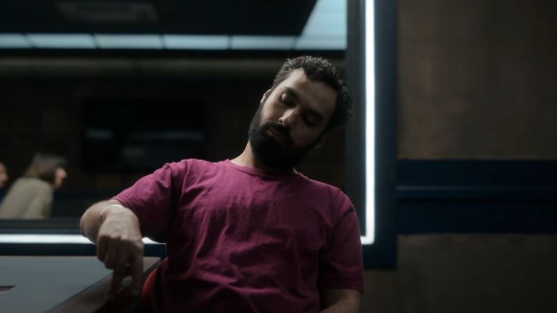 Kumail Naayar in the role of Sandeep Singh in an interrogation room in the criminal