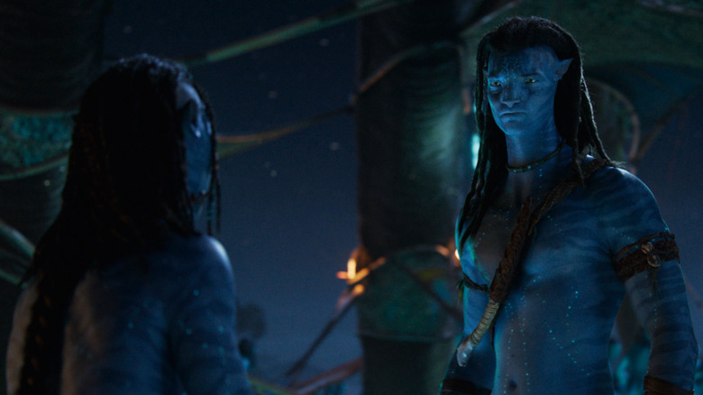 Sam Worthington as Jake Sully giving a stern talk to Britain Dalton as Lo'ak in Avatar: Fire & Ash