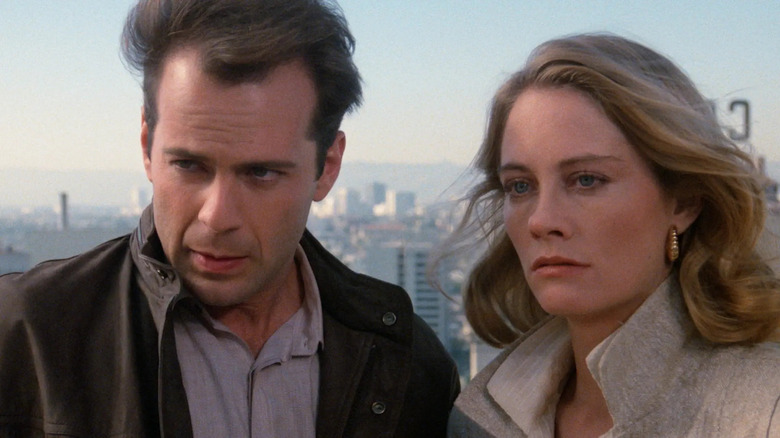 David and Maddie looking concerned in Moonlighting