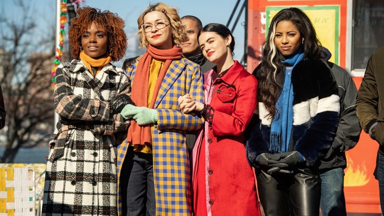 Ashleigh Murray like Josie, Julia Chan like Pepper Smith and Lucy Hale like Katy Keene with their friends in Katy Keene