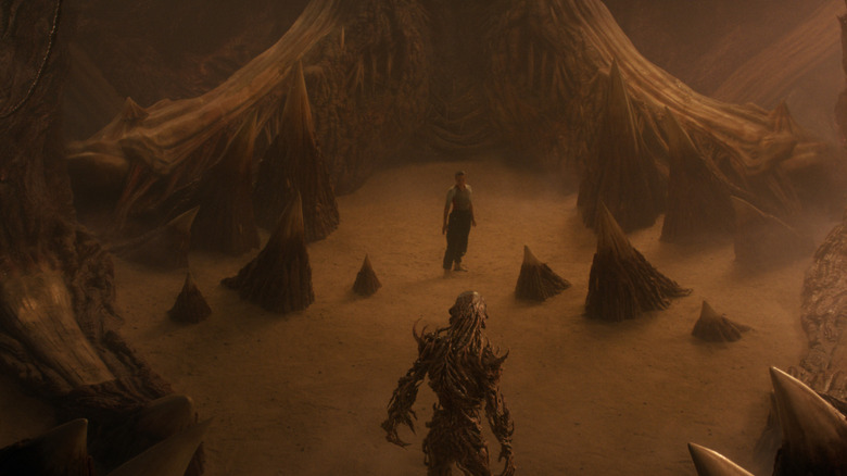 Vecna facing off against Eleven inside the mouth of a giant spider in Stranger Things