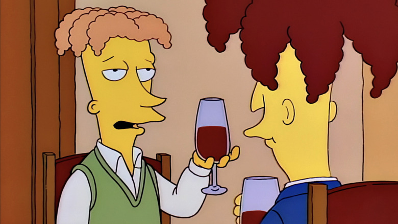Cecil holds a glass of wine while talking with Sideshow Bob in The Simpsons