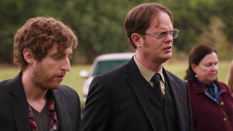 Thomas Middleditch as Jeb Schrute standing next to Rainn Wilson as Dwight Schrute in the Office episode The Farm