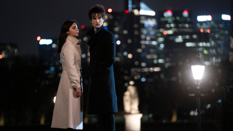 Standing in front of a cityscape in The Sandman