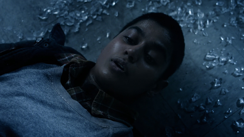 Linnea Berthelsen's Kali Prasad lays on the floor in Stranger Things