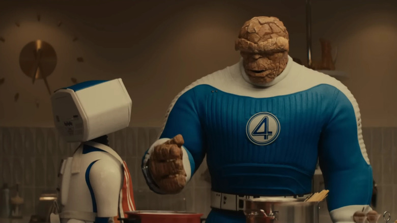 The Thing and H.E.R.B.I.E. making dinner in the kitchen in The Fantastic Four: First Steps