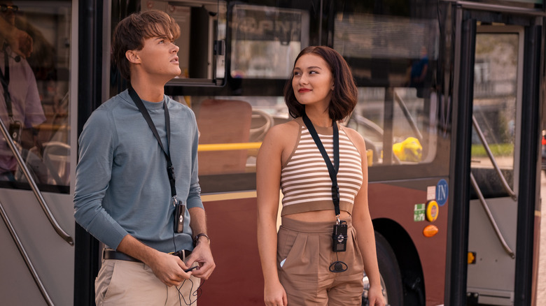 Belly and Conrad outside of a tour bus in Paris in The Summer I Turned Pretty