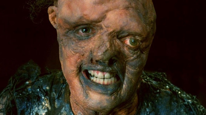 The Toxic Avenger smiling in The Toxic Avenger (1984)