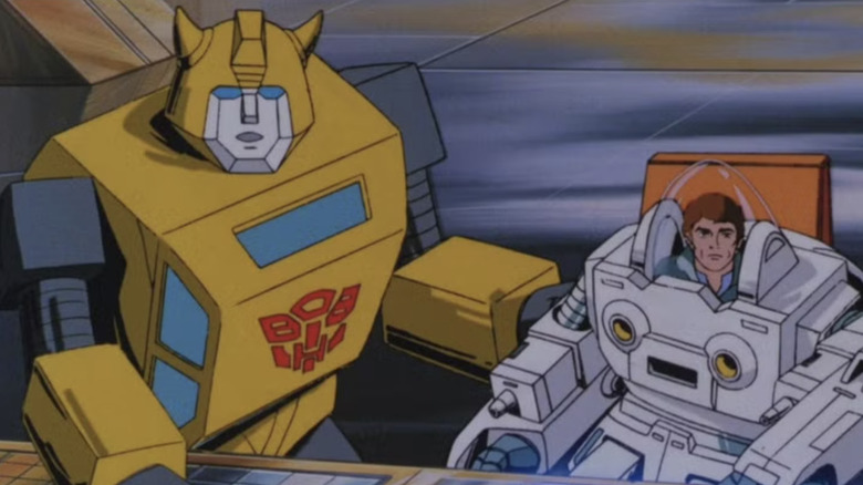 Bumblebee and Spike Witwicky (in exo suit) together in The Transformers: The Movie