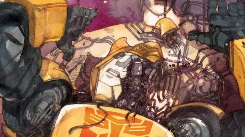 Bumblebee lying dead with his face broken in the Transformers #1 variant cover