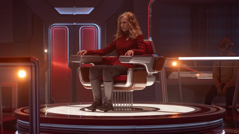Holly Hunter's Nahla Ake sitting on the captain's chair of USS Athena on Star Trek: Starfleet Academy