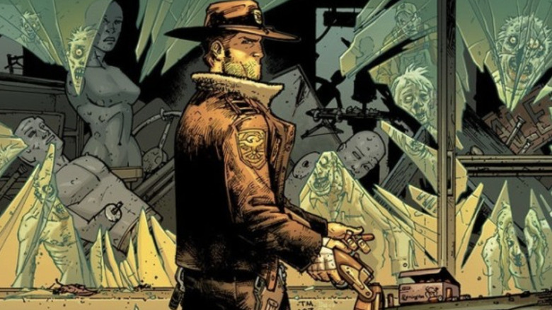 The Walking Dead #1 comic cover, showing Rick Grimes loading shotgun in front of smashed windows