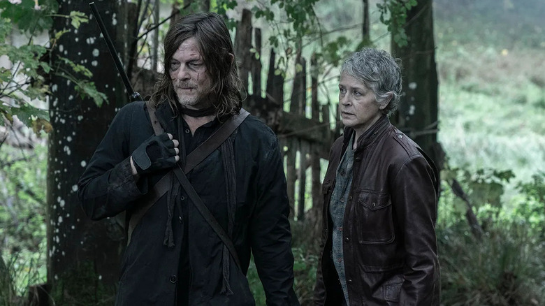 Daryl and Carol standing outdoors in The Walking Dead: Daryl Dixon