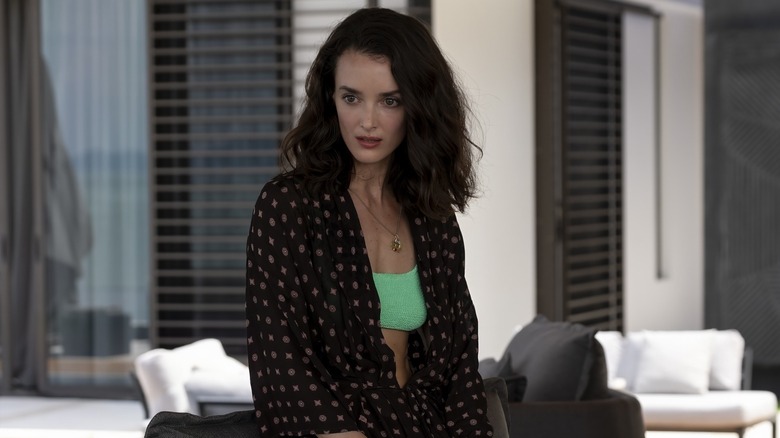 Chloe in a bathing suit and coverup in The White Lotus