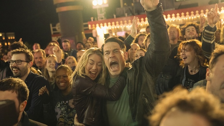 Chris and Harcourt scream in joy at a rock concert in Peacemaker