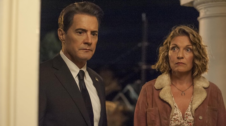Dale Cooper and Laura Palmer standing at a doorstep in Twin Peaks: The Return