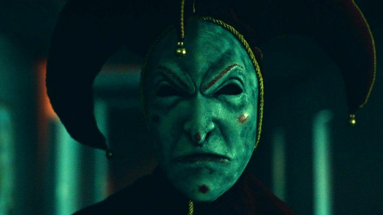 The Fool (Felix Leech) frowns angrily in Tarot (2024)