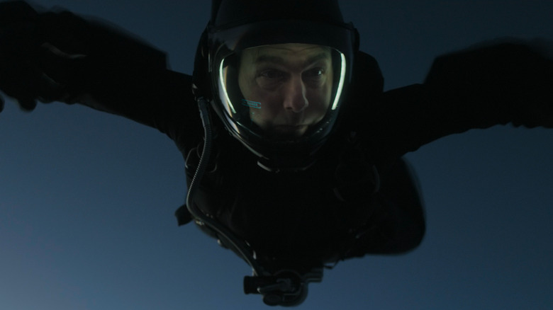 Tom Cruise in helmet performing halo jump