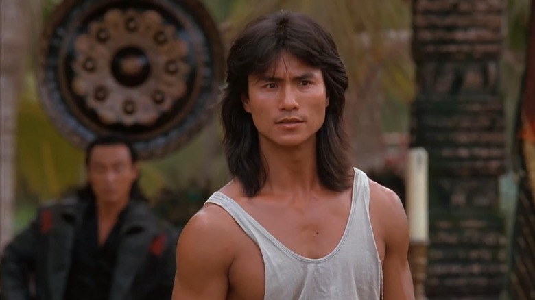 Robin Shou as Liu Kang looking concerned in Mortal Kombat (1995)