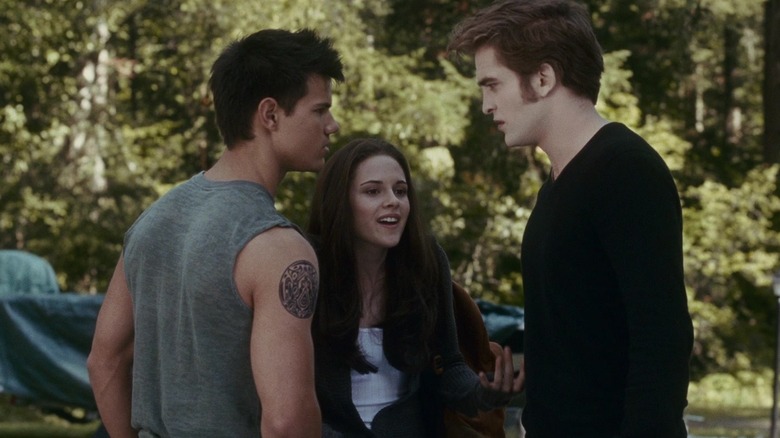 Bella and Edward talking to Jacob in the woods in The Twilight Saga: Eclipse