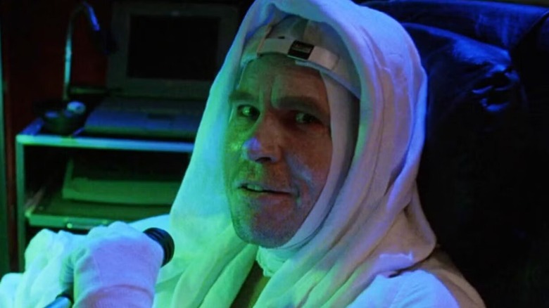 Dr. Montgomery wearing a white gown in "The Island of Dr. Moreau"