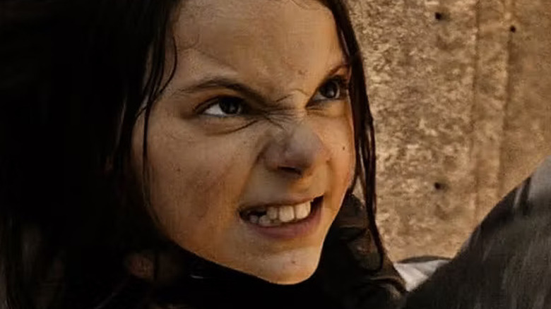 X-23 fighting a grunt with her adamantium claws in Logan