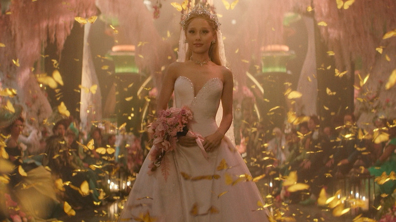 Ariana Grande as Glinda walking down the aisle during her wedding in Wicked: For Good