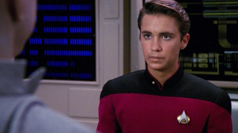 Wesley Crusher, standing in the main engineering, looking stressed.