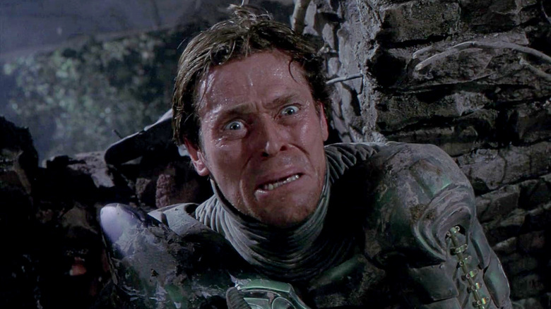 Willem Dafoe as Norman Osborn aka Green Goblin, looking defeated and distraught, in Spider-Man