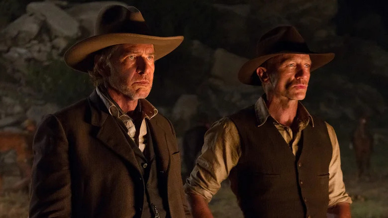 Daniel Craig's Jake Lonergan stands beside Harrison Ford's Woodrow Dolarhyde in Cowboys & Aliens