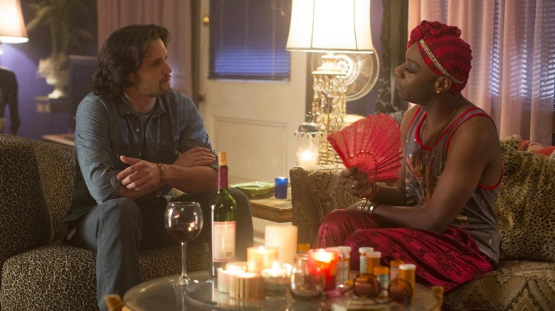 Nathan Parsons in the role of James Kent and Nilesan Ellis in the role of Lafayette in a living room in real blood