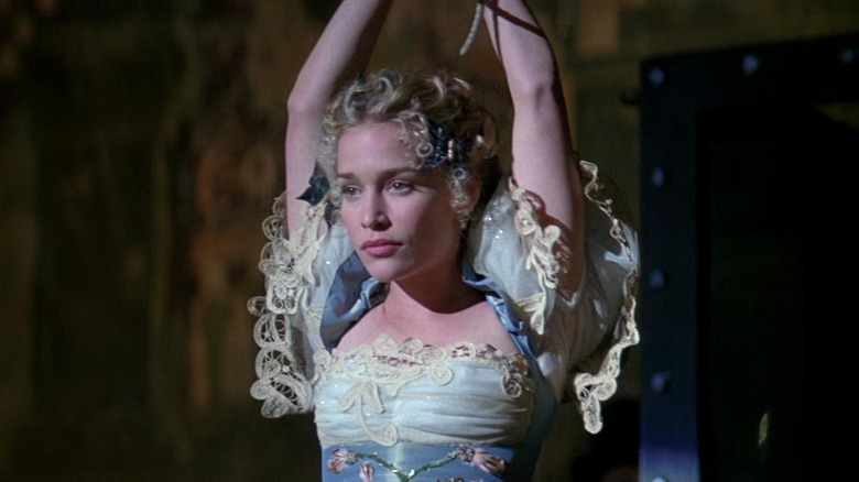 Julia tied up for a magic act in a gown in The Prestige