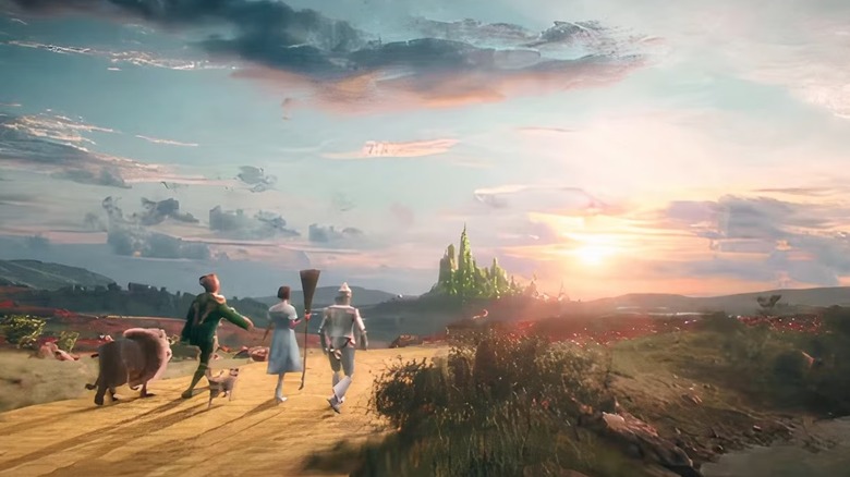 Cowardly Lion Scarecrow Toto Dorothy and the Tin Man walking on the Yellow Brick Road to Oz in Wicked