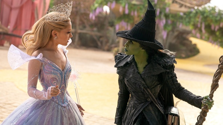 Glinda and Elphaba arguing on the yellow brick road in Wicked: For Good