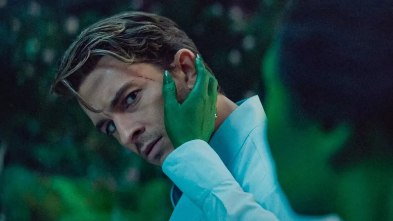 Elphaba touching Fiyero's face in Wicked