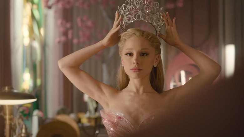 Ariana Grande as Elphaba putting on her crown in Wicked: For Good