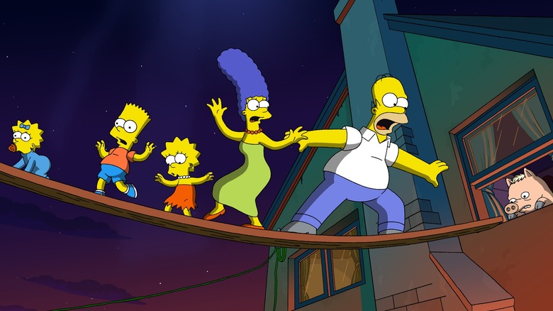The Simpsons balancing on a board