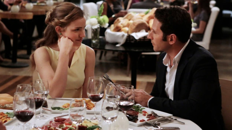 Emma and Evan at dinner in Royal Pains