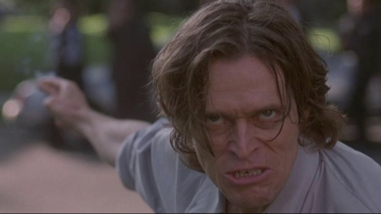 Willem Dafoe intense and pointing