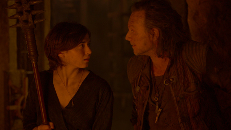 Ruby Cruz as Kit Tanthalos and Christian Slater as Allagash in Willow