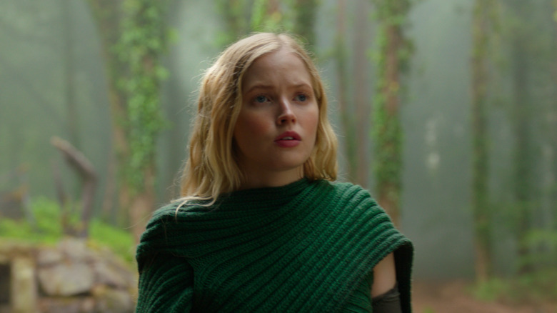 Ellie Bamber in the woods in Willow