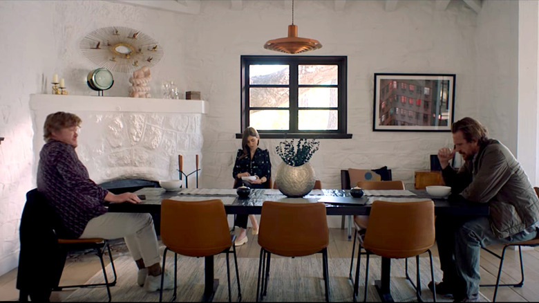 The CEO, the wife, and nobody sitting at a table
