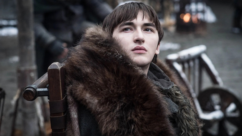 Bran Stark (Isaac Hempstead Wright) looks up from his chair in Game of Thrones