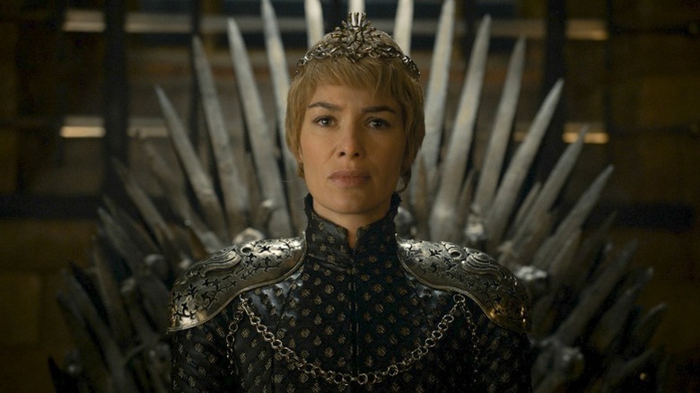 Cersei Lannister (Lena Headey) sits grimly on the Iron Throne in Game of Thrones
